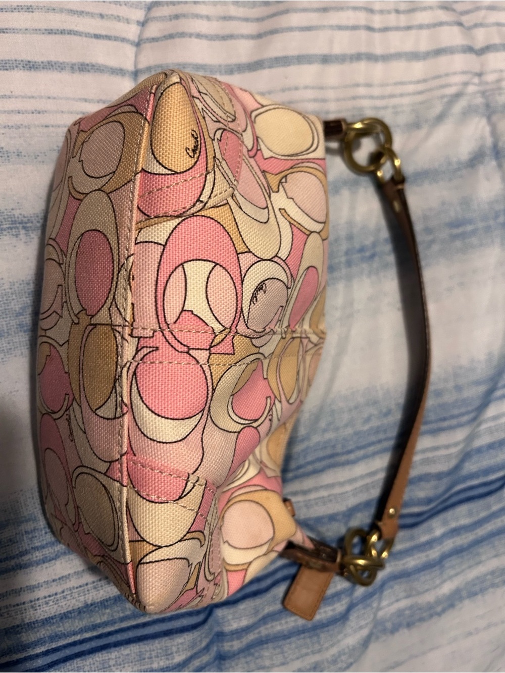 Coach Pink and Cream Signature C Pattern Mini Wristlet with Tan Strap